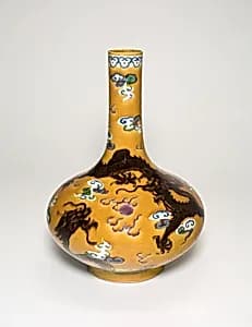 Enameled bottle vase by Unknown