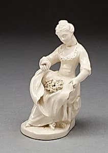 Girl with Bird Nest by Unknown