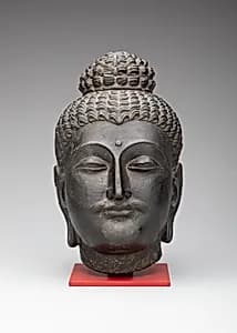 Head of Buddha by Unknown