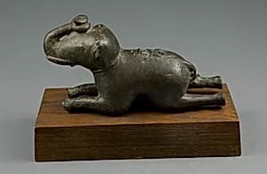 Kneeling Elephant by Unknown