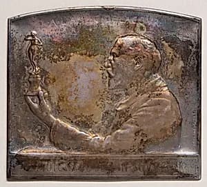 Medal portraying Delacour by Victor David Brenner