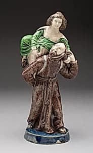 Monk Carrying Woman by Avon Pottery