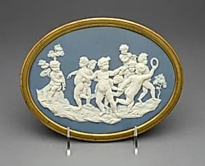 Plaque with Boys Playing