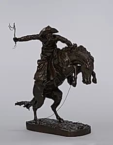 The Bronco Buster by Frederic Remington