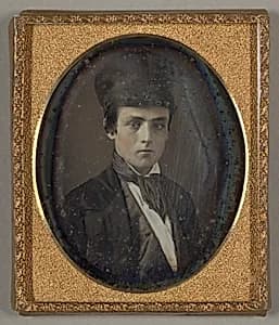 Untitled (Boy with Hat) by Unknown