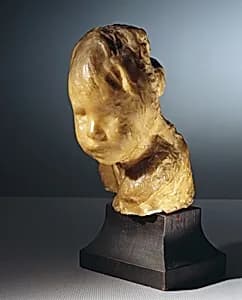 Kinderköpfchen by Medardo Rosso
