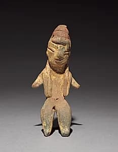 Archaic Figurine by Unknown Artist