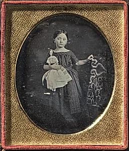 Girl with Doll by Unknown Artist