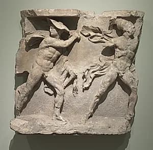 Relief of Striding Warriors by Unknown Artist