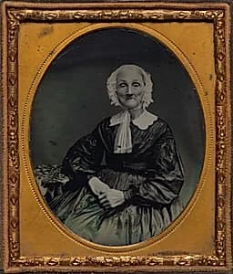 Seated old woman by Unknown Artist