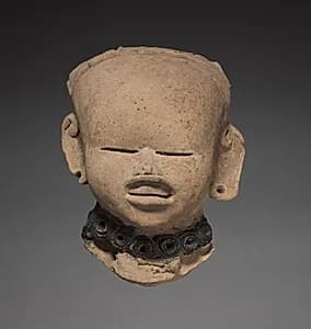 Smiling Head by Unknown Artist