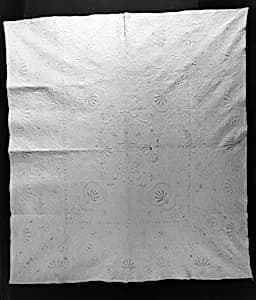 Embroidered and stuffed whitework quilt by Unknown Artist