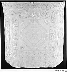 Embroidered whitework coverlet by Prudence Clark