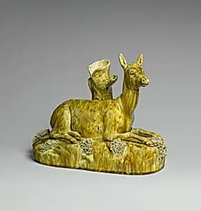 Figural spill vase by Lyman, Fenton & Co.
