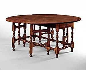 Oval table with falling leaves by Unknown Artist