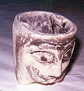 Bowl with human head by Unknown Artist