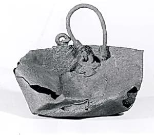 Bucket with attachments and handle by Unknown Artist