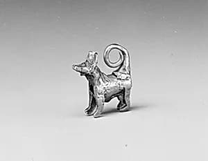 Dog pendant by Unknown Artist