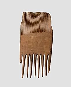 Double-sided wooden comb by Unknown Artist