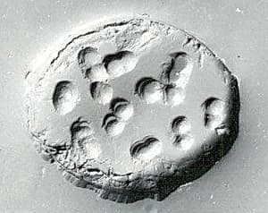 Drilled half almond seal by Unknown Artist