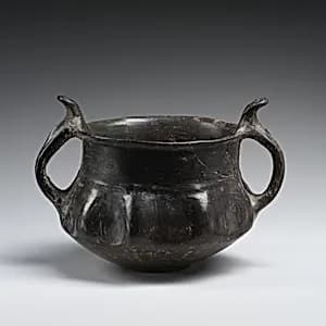 Fluted bowl with two handles by Unknown Artist