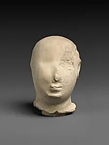 Fragmentary head of a worshiper by Unknown Artist