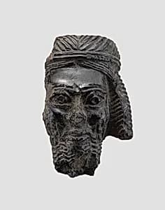 Head of a male figure by Unknown Artist