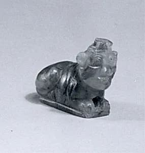 Lion amulet with human head by Unknown Artist