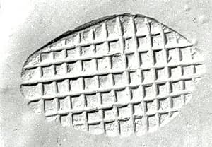 Loop-handled conical (?) stamping device by Unknown Artist
