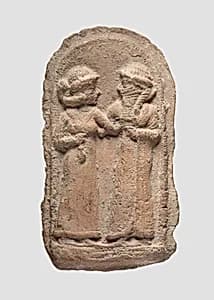 Molded plaque: couple by Unknown Artist