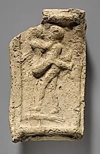 Molded plaque: couple by Unknown Artist