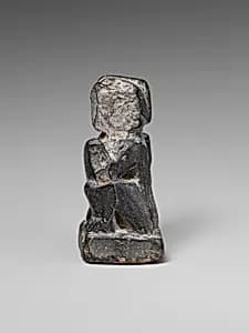 Seated figure by Unknown Artist