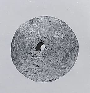 Spindle whorl by Unknown Artist