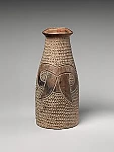 Bottle with fang motif by Cupisnique artist(s)