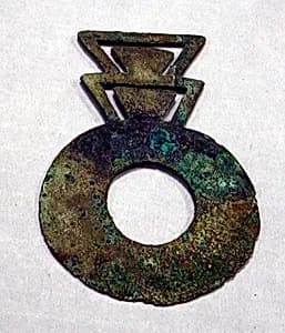 Copper Disk Ornament with Triangles by Unknown Artist