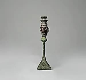 Copper Rattle and Stone Head by Unknown Artist