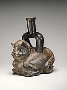 Feline-shaped stirrup-spout bottle by Cupisnique artist(s)