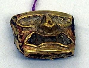 Gold Face Mask Ornament by Unknown Artist