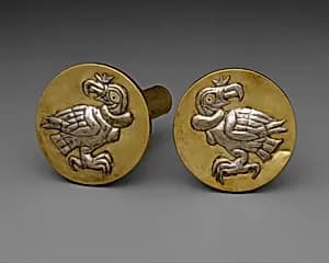 Pair of earflares with condors by Unknown Artist
