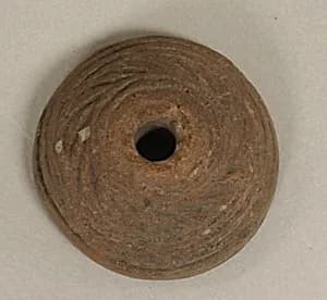 Spindle Whorl by Unknown Artist
