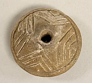 Spindle Whorl by Unknown Artist