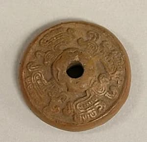 Spindle Whorl by Unknown Artist