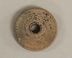 Spindle Whorl by Unknown Artist
