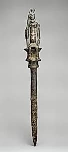 Staff: Seated Male Figure