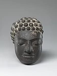 Head of a Buddha by Unknown Artist