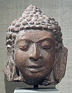 Head of a Buddha by Unknown Artist