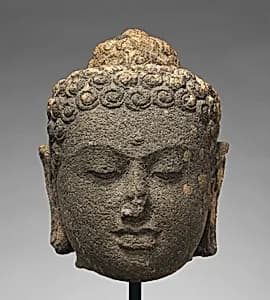 Head of a Buddha by Unknown Artist