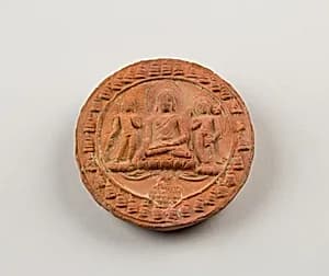 Molded Plaque with Seated Buddha and Attendant Bodhisattvas by Unknown Artist