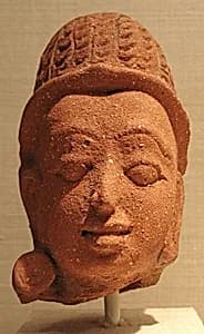 Head of a Deity by Unknown Artist