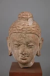 Head of Buddha by Unknown Artist